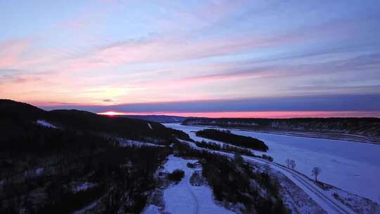 东北黑龙江漠河雪景夕阳航拍