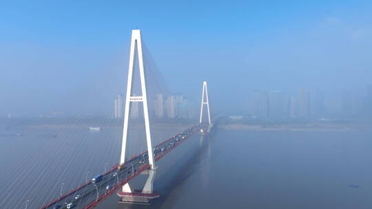 航拍云雾中的清晨武汉白沙洲大桥