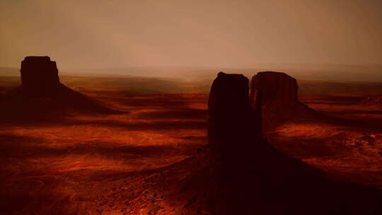 一个宁静的沙漠景观与雄伟的岩石和广阔的天