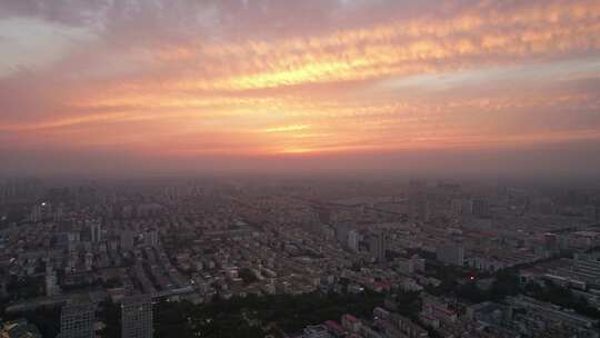 山东济宁城市晚霞夜幕降临航拍