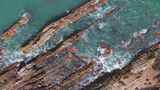 深圳杨梅坑礁石海岸航拍高清在线视频素材下载