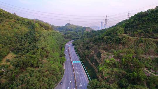 航拍山丘之间乡间高速公路道路交通枢纽视频素材模板下载