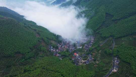 航拍大山云海和美丽乡村