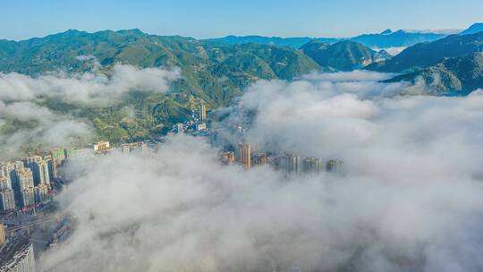 航拍延时城市云海日出云瀑云海流动万源