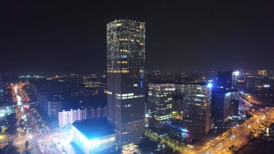 航拍夜晚金华城区道路交通现代办公大楼夜景
