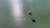 阳光下渔船航拍轮船行驶货船海上货轮捕捞船高清在线视频素材下载