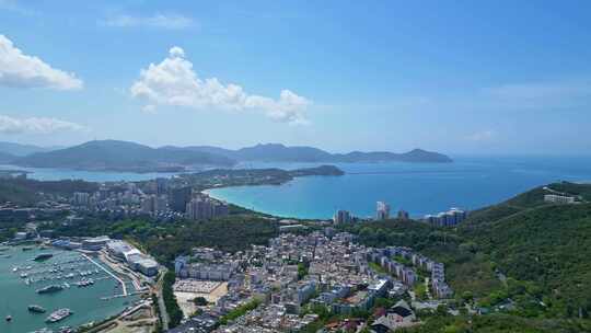 海南三亚航拍蓝天白云三亚湾城市凤凰岛海洋