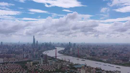 多云天空下上海大全景