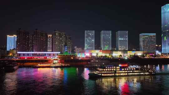 航拍宜昌城市夜景和长江夜游船