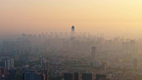 中国河南郑州清晨日出晨雾城市风光航拍