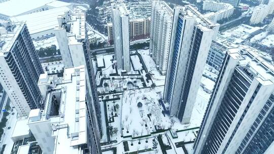 航拍城市下雪城市雪景