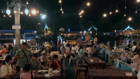 西双版纳告庄星光夜市傣族澜沧江边水上餐厅视频素材模板下载