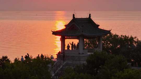 航拍北戴河鸽子窝湿地公园海上日出视频素材模板下载