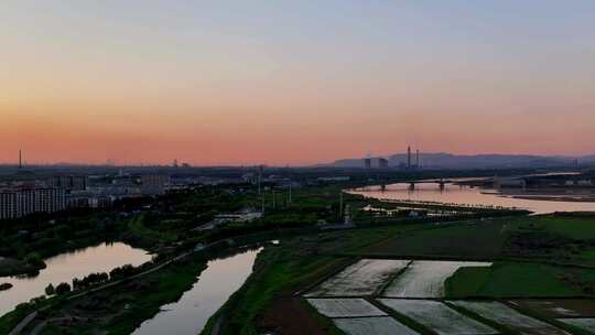 航拍夕阳下宁夏石嘴山惠农区城市风光视频素材模板下载