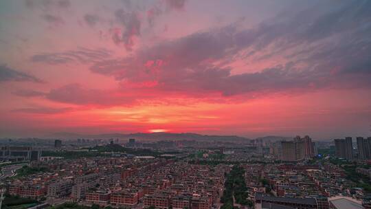 义乌江东夏季城市晚霞日转夜延时摄影