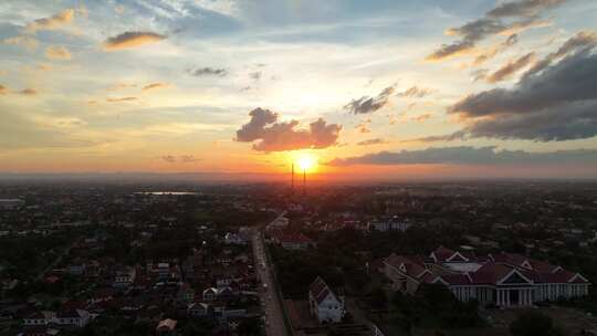 4K航拍夕阳下老挝首都万象城市风光