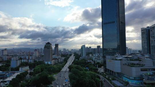 航拍城市雨后烟囱、云、建筑群