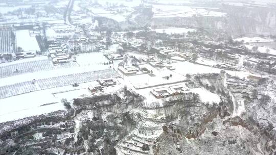 黄土高原雪山居住房屋雪景航拍