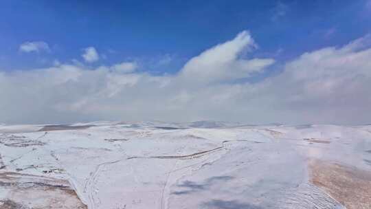 航拍高原山区下雪雪山