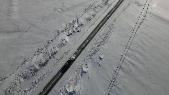 冬季雪天内蒙乌兰布统塞罕坝草原公路4K航拍视频素材模板下载