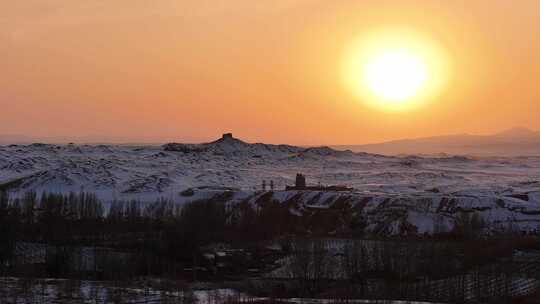 敦煌阳关冬季日落雪景航拍