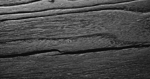 黑色木纹肌理特写深色木板纹理背景碳化木头