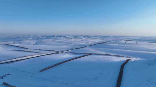 航拍寒冬内蒙古垦区雪原风光