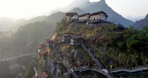 悬崖上的房屋人间仙境日出美景