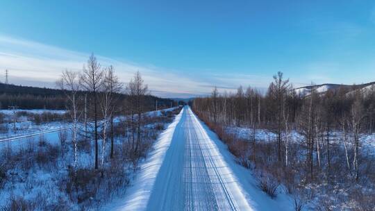 航拍林海雪原雪路