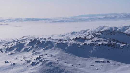 航拍新疆阿勒泰雪景吉木乃草原石城输电线路