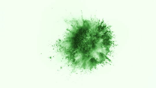 绿色粉末在白色背景前爆炸