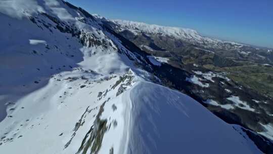 FPV穿越机无人机航拍雪山高山山脉森林阳光