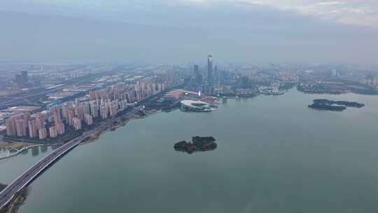 江苏苏州金鸡湖东方之门CBD日落夜景航拍