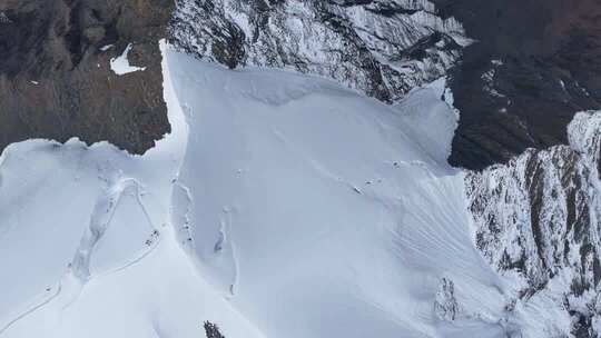 航拍四川甘孜那玛峰雪山之巅壮丽景色
