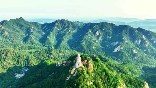 航拍千山绿色山林和大佛寺塔