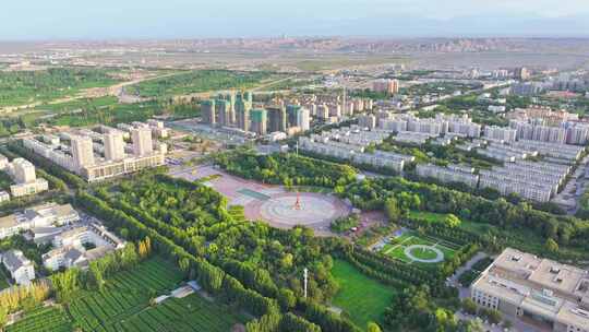 航拍新疆鄯善县沙漠绿植城市风光