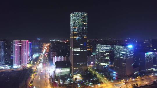 航拍夜晚金华城区道路街道路口交通车流夜景