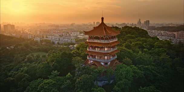 航拍夕阳下的广州鸿鹄楼