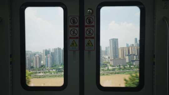 地铁轻轨窗外的风景视频素材模板下载