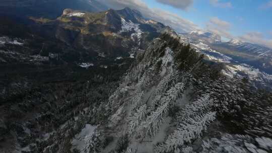 FPV无人机航拍雪山森林树林山脉蓝天白云