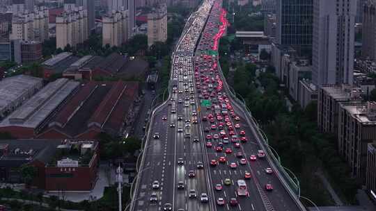 航拍上海汶水路立交桥城市晚高峰车来车往