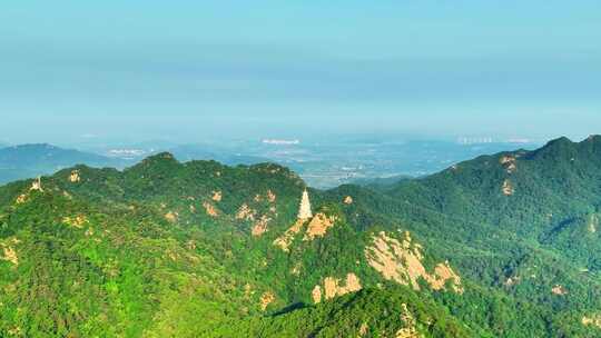 航拍千山绿色山林和大佛寺塔