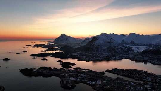 4K航拍北欧挪威斯沃尔维尔雪景日落美景