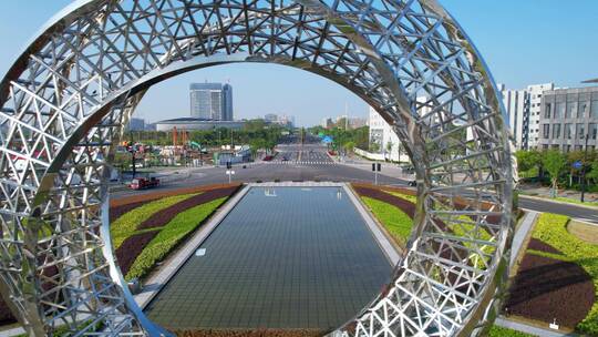 航拍上海临港新城海港大道雕塑视频素材模板下载