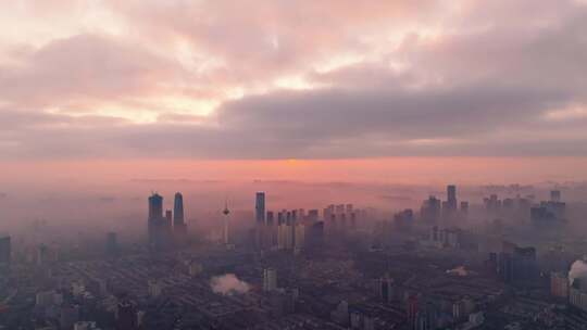 城市风光建筑航拍早晨朝霞地标建筑红霞满天