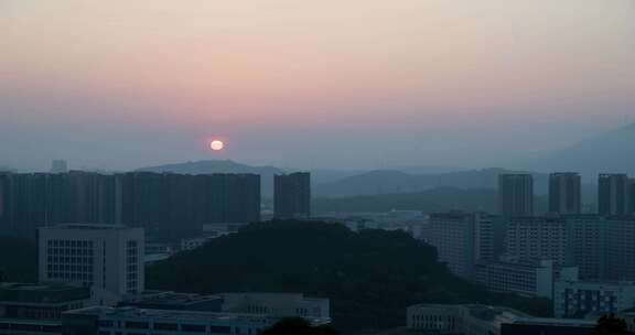 4K太阳从城市地平线升起延时摄影