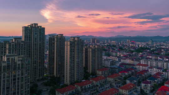 城市日落夕阳火烧云延时县城城区航拍延时