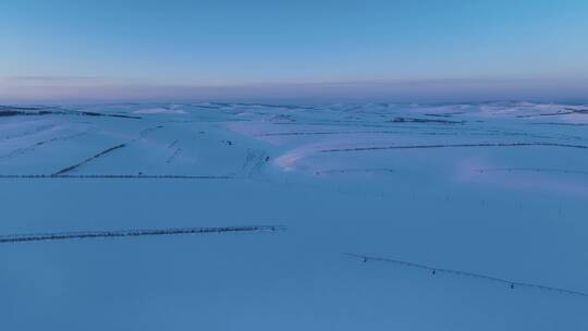 内蒙古雪原雪景夕阳余晖航拍