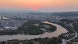 航拍广西百色日落晚霞夕阳高清在线视频素材下载