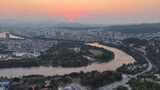 航拍广西百色日落晚霞夕阳高清在线视频素材下载